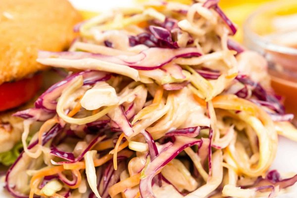 What's the Key to a Flavorful and Elegant Gourmet Coleslaw with Unique Additions?